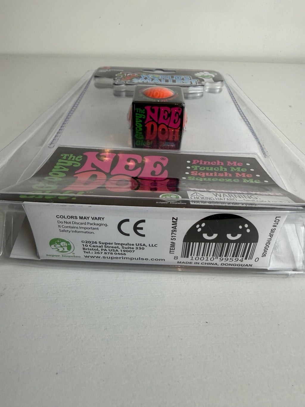 WORLD'S SMALLEST NeeDoh GROOVY GLOB – MINI ORANGE