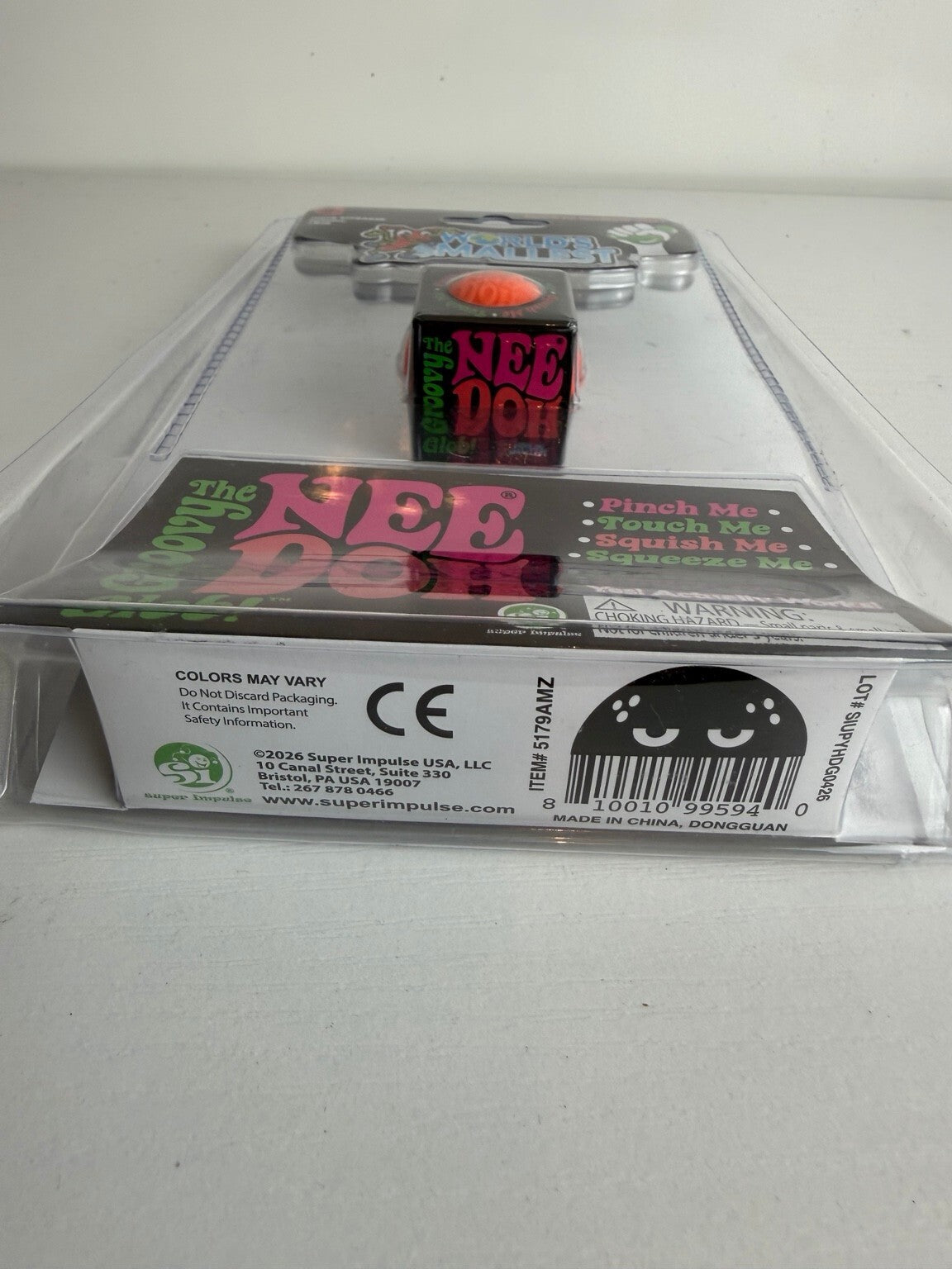 WORLD'S SMALLEST NeeDoh GROOVY GLOB – MINI ORANGE